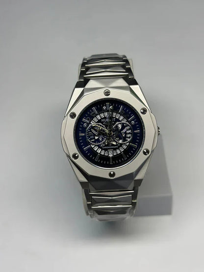 HUBLOT GENEVE MASTER LOCK-DATE ADJUST SKELETON WATCH